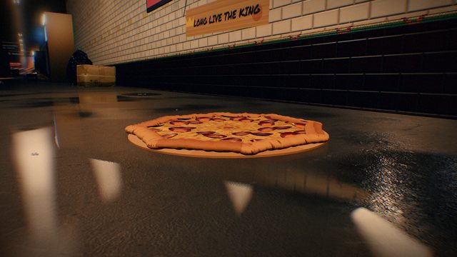 Something on the platform floor in front of the rat.